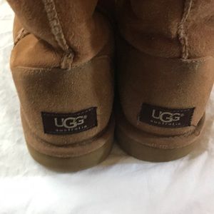 Tan Ugg boots size 8.